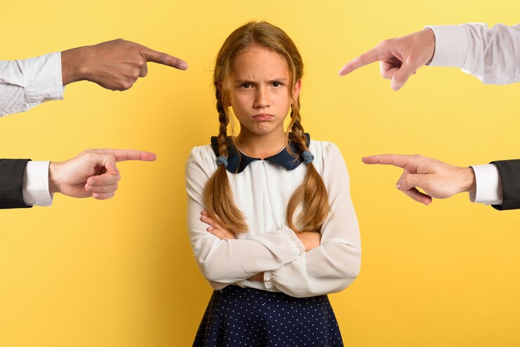 young-girl-is-unhappy-angry-because-she-is-accused-yellow-background_207634-1590