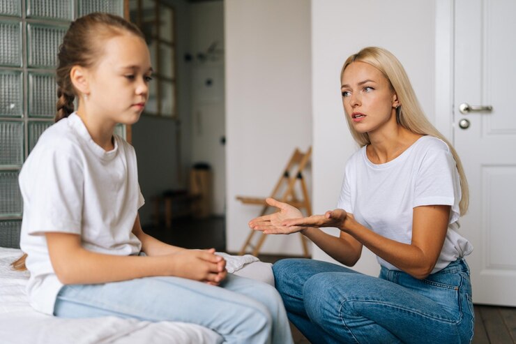 irritated-young-mother-lecturing-little-stubborn-daughter-bad-behavior-school-home-concept-family-problems-conflict-crisis_482921-9818