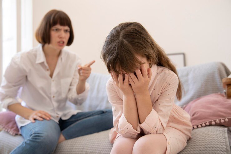 medium-shot-upset-mother-scolding-daughter_23-2149028867