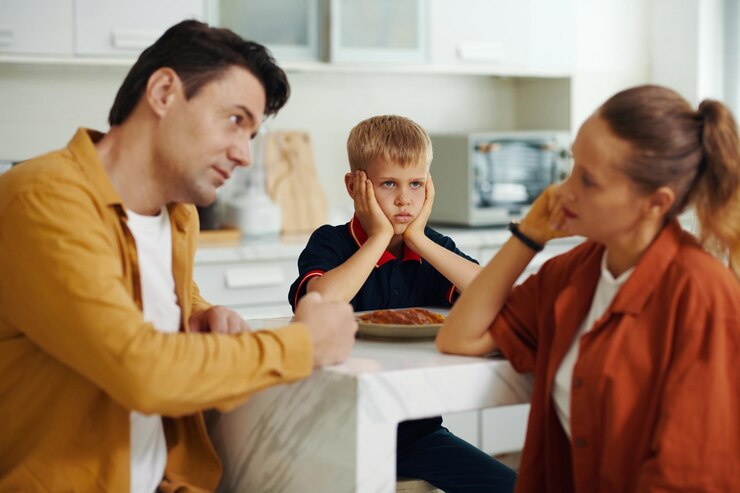 child-worrying-quarrel-his-parents_274689-52635
