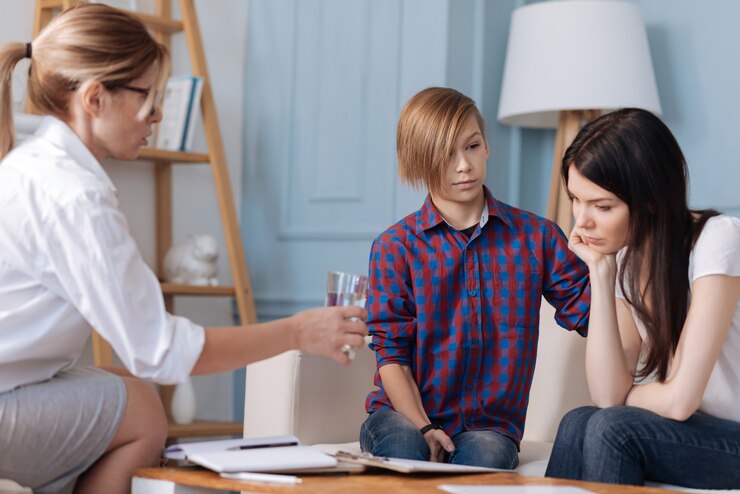 very-sad-mother-wearing-casual-clothes-holding-her-chin-her-hand-while-looking-downwards_259150-15973