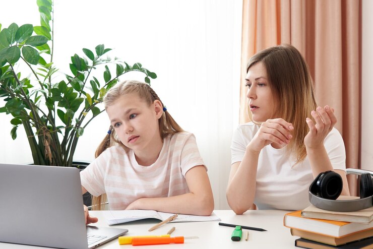 mother-helping-daughter-with-homework_1048944-13196164
