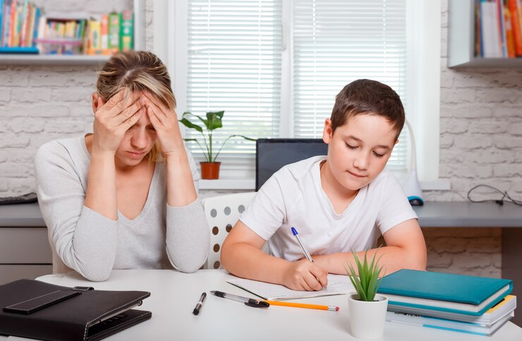 mother-helping-her-son-homework_210733-310