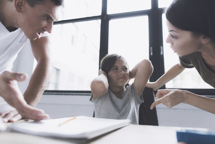 child-closed-ears-when-parents-scolding-room_85574-645